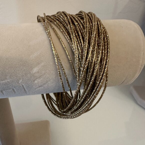 Multi-strand gold-toned wire bracelet - Picture 1 of 5